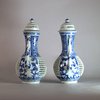 AA16 A pair of blue and white double-walled reticulated ewers and covers of slender form, Kangxi(1662-1722)