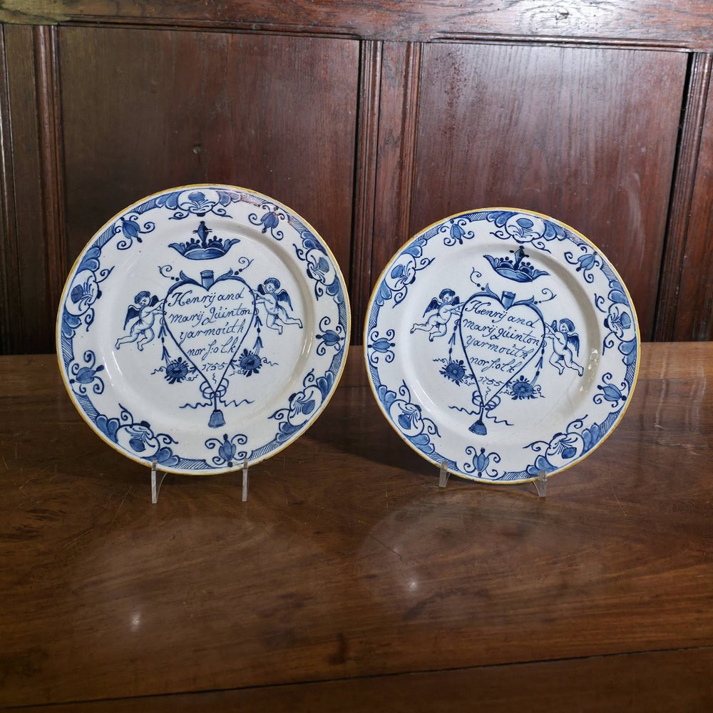 AA50 A pair of English 18th Century Delft marriage plates, 'Henry & Mary Quinton, Yarmouth Norfolk, 1755' A