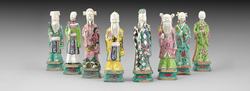 Eight Chinese famille rose Daoist immortals, Qing dynasty, circa 1780 each figure holding its attribute, 24cm high