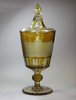 D245 A Bohemian amber glass cup and cover, 19th century