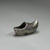 H811 Dutch silver-metal miniature of a clog