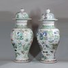 JB60 Matched pair of famille verte baluster vases and covers