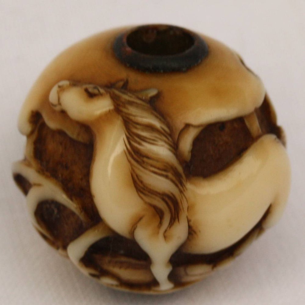 N749 Carved ivory ojime bead, Meiji, signed Yukimasa, of a horse