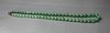 N922 Jade necklace of graduating beads, length: 19in., 48.4cm. 