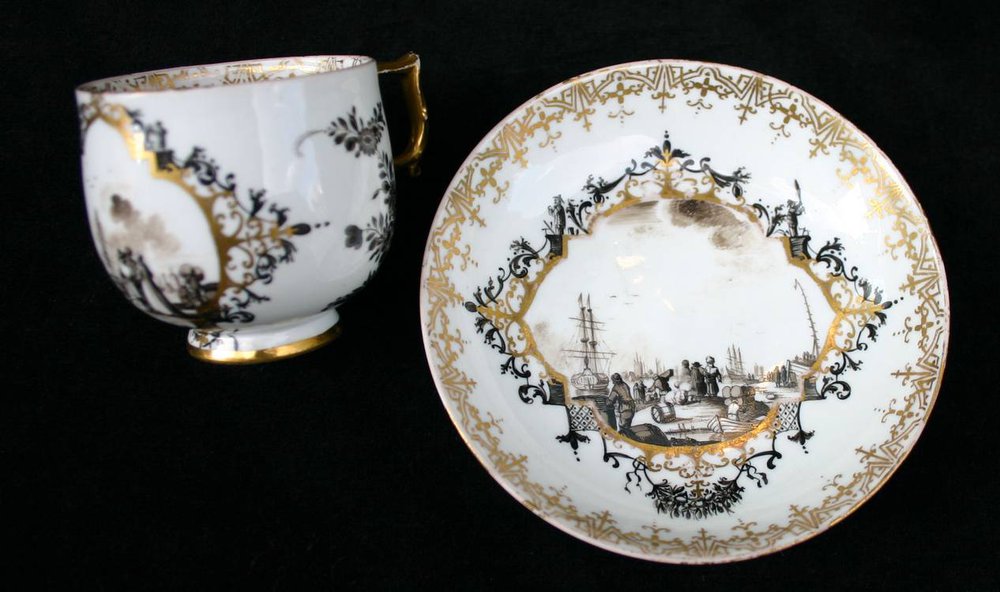 N926 A Meissen Schwartzlot teacup and saucer, circa 1740