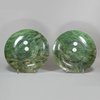 P180 Pair of Chinese spinach green jade circular dishes