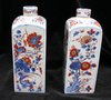 Q225 Pair of Chinese imari square-sectioned bottle vases and covers