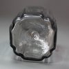 R986 An English cruciform-shape glass decanter, mould blown