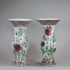 U826 Pair of famille rose vases of baluster shape