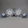 U868 Pair of Chinese blue and white moulded teabowls and saucers