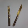 U957 Set of six Japanese gilt-steel knives and forks with kozuka