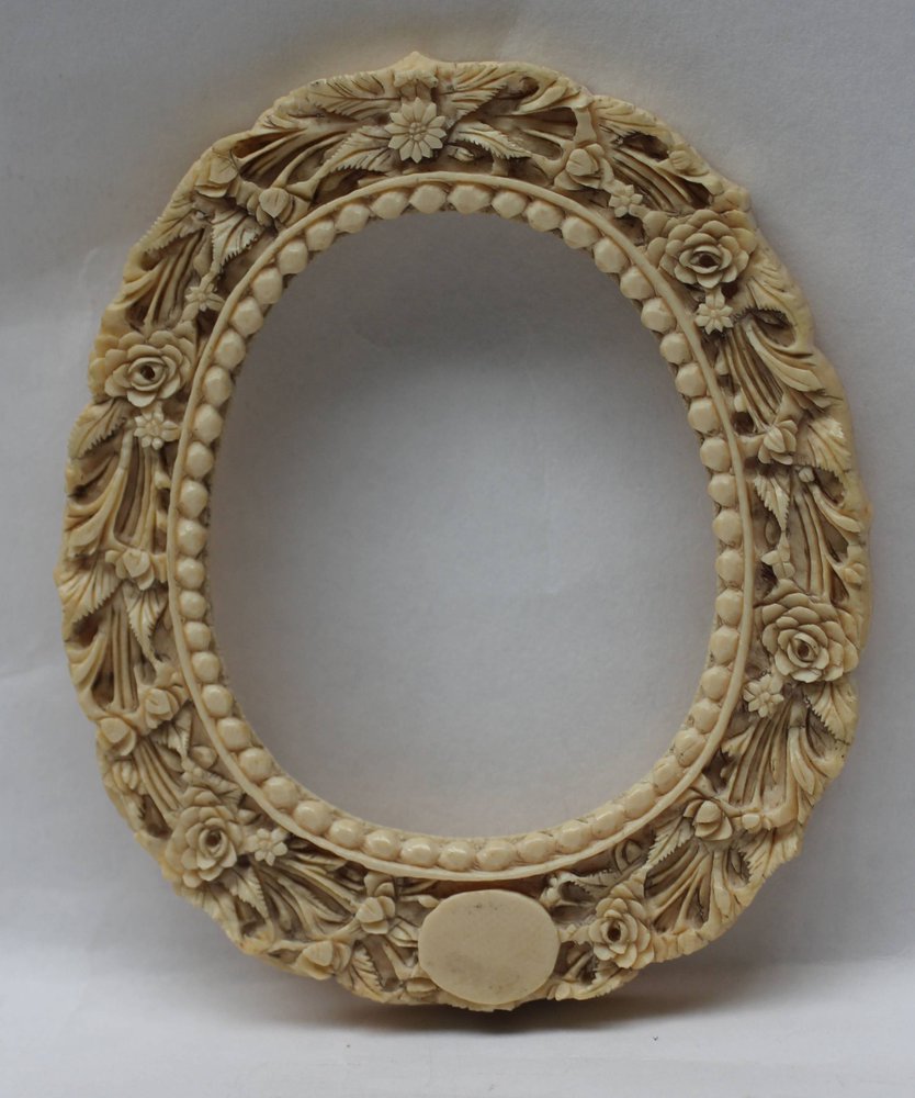 V288 Cantonese carved ivory frame, of oval form