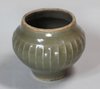 V813 Small ribbed celadon jar, Yuan Dynasty (1280-1368), height: 2 1/2in. 6.5cm.