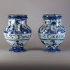 W245 Pair of Italian tin-glazed earthenware Savona wet drug jars