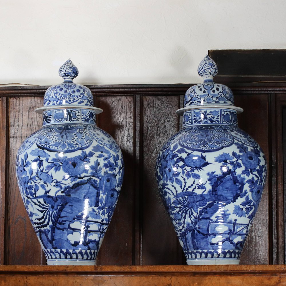 W389 Pair of Japanese blue and white baluster jars and covers