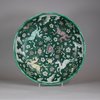 W706 Chinese rare biscuit dish mid 17th century early Kangxi(1662-1722), decorated in three colours (sancai) with galloping horses among billowing waves and the Eight