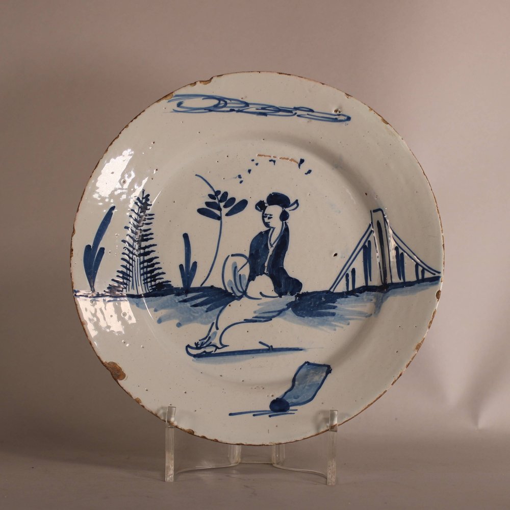 W873 English delft blue and white plate; circa 1750-60,  painted with a seated oriental figure