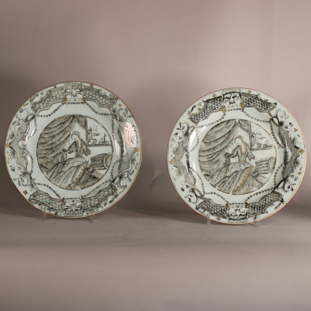 W879 Pair of Chinese 'European-subject' dishes, Qianlong (1736-95), each decorated with an interior scene depicting a lady sewing with a port visible through a window above.