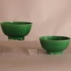 W889 A pair of finely potted Chinese monochrome green-glazed bowls, Kangxi (1662-1722)