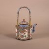 W918 A Chinese Qianlong enamel teapot and cover, with looped fixed handle,