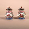 W921 A pair of early Chinese Qianlong Canton enamel pomode pots and covers,