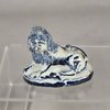 W993 Rare small Dutch delft blue and white figure of a miniature recumbent lion