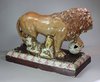 X159 English creamware model of a standing Medici lion