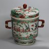 X55 Famille verte twin-handled jar and cover on a spreading foot