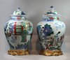 X859 Pair of Chinese wucai baluster vases and covers