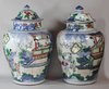 X859 Pair of Chinese wucai baluster vases and covers
