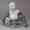 Y257 Famille verte biscuit figure of the laughing Budai/Hotei