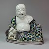 Y257 Famille verte biscuit figure of the laughing Budai/Hotei