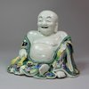 Y258 Famille verte biscuit figure of the laughing Budai/Hotei