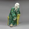 Y424 Famille verte biscuit figure of a sage, Kangxi (1662-1722)